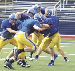 The Spartan offensive and defensive lines goes through full-contact drills at one of their final practices this week.