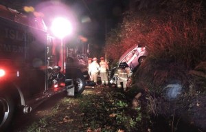 Bainbridge fire crews remove a driver from his car just after 10 p.m. Wednesday. In a one-car crash