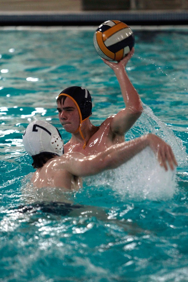 BHS freshman 2MD Will Thompson takes his pass over the head of a defensive Gig Harbor player during Tuesday's home match.