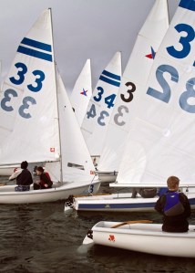 The students work in pairs at practice. The spring season events require two-person