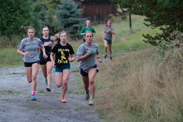 The Bainbridge High cross country team practiced at Johnson Farm recently. Varying the practice course