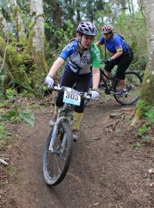 Bainbridge Gear Grinder Tessa Vroom on the trail during the bicycle team’s first race event last weekend in Port Gamble. Vroom finished second in her category at the event.