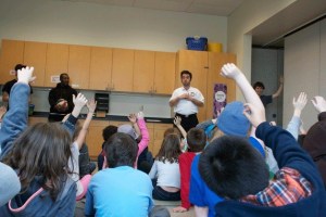 Admirals Coach Chris Koebelin asks kids at the Bainbridge Boys & Girls Club if they have experienced any forms of bullying.