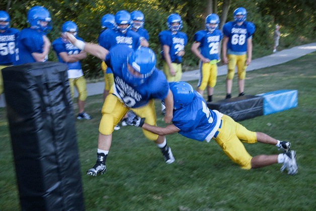 Daily double practices ended earlier last week as the Bainbridge High School football team settled into a regular practice routine in preparation for the start of the 2014-2015 season.