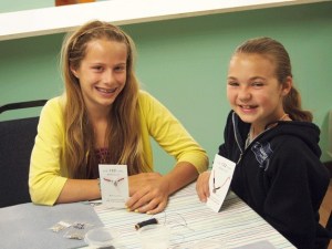 Pilar Hemingway and Dana Craighead hand make each bracelet to raise money for their friends who worked at  The 122. The restaurant was their families’ favorite island hangout.