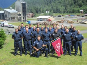 The graduates of the Washington State Patrol Fire Training Academy gather for a photo at the academy in North Bend.