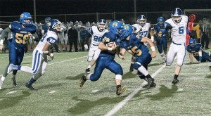 BHS senior wide receiver Peter Lindsay drives the ball around the defensive efforts of Seattle Prep last Friday.