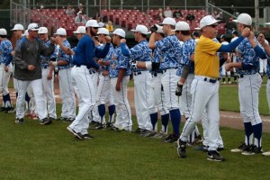 The BHS coaching staff enter the field and psyche up the varsity baseball team just prior to the start of the their first 2014 3A Baseball Region III Tournament playoff game