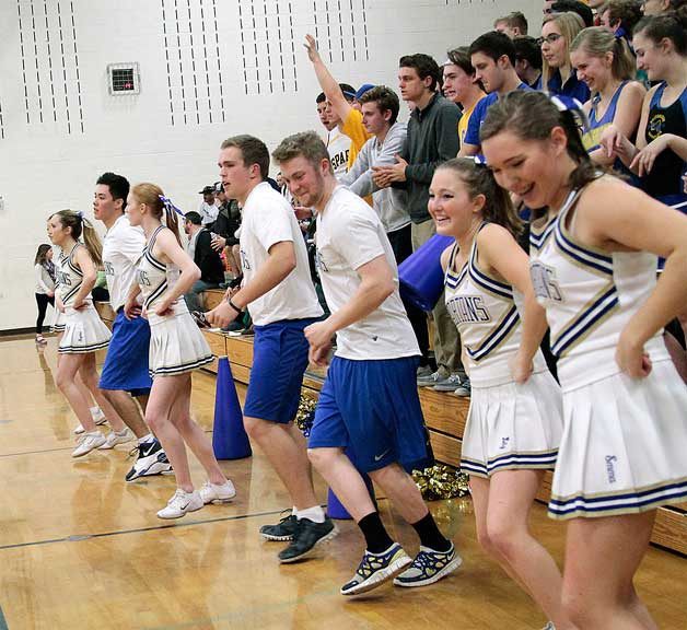 Four senior boys have been active on the Bainbridge High varsity cheer squad this year