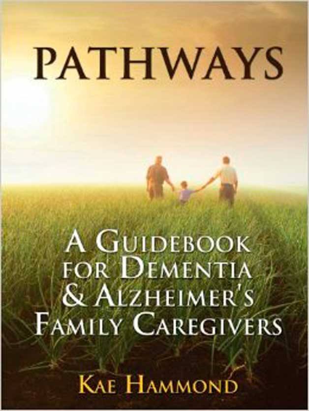 Author explains guidebook during visit to Eagle Harbor Books