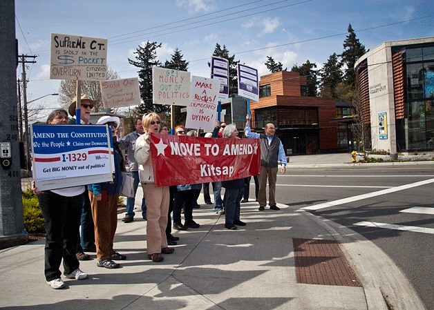 Protesters pause at the Waypoint