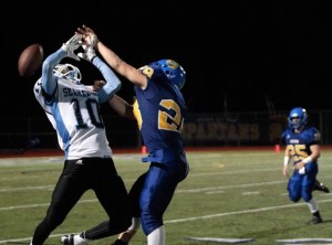 BHS senior wide receiver Peter Lindsay misses an attempted interception Thursday.