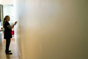 Members of the Bainbridge Island Museum of Art’s Exhibition Assembly Crew work for days behind the scenes to ready the galleries and hang the art works of new exhibitions. If they’ve done their job right