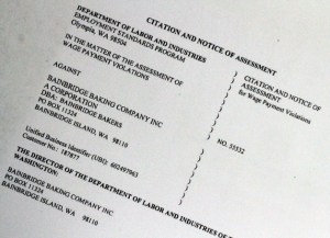 The former owner of Bainbridge Bakers has been ordered to pay back wages for employees who went without paychecks earlier this year.