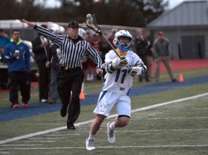 Bainbridge’s Nate Marx makes a pass during Friday’s home game against Lakeside.