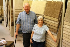 Steve Shawley and Judy Dulay pause for a photo on their last day in their Winslow Way store.
