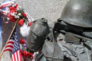 The memorial statue at Bainbridge High School is decorated for Memorial Day.