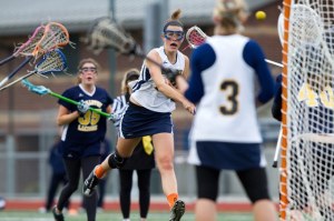 Junior Jacyln Biggers scores one of her five goals against Bellevue Monday.