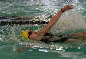Laura Murphy backstrokes through the 200-yard individual medley event in Friday’s home meet against Garfield.