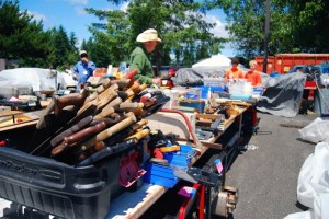 At one end of the parking lot at Woodward Middle School are tables of hand and power tools