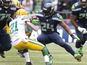Packers' Ha Ha Clinton-Dix attempts to close on Seahawks' Marshawn Lynch during the NFC Champion at Century Link Field In Seattle