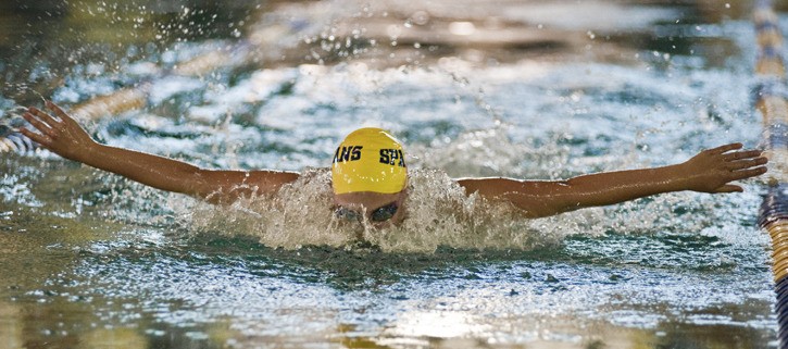 Sophomore Anna Peirano cruises to a win in the 100-yard butterfly earlier this season