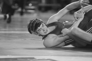Alex Hoover tries to fight out of a pin attempt by Shadle Park’s Darren Bunke at Mat Classic.
