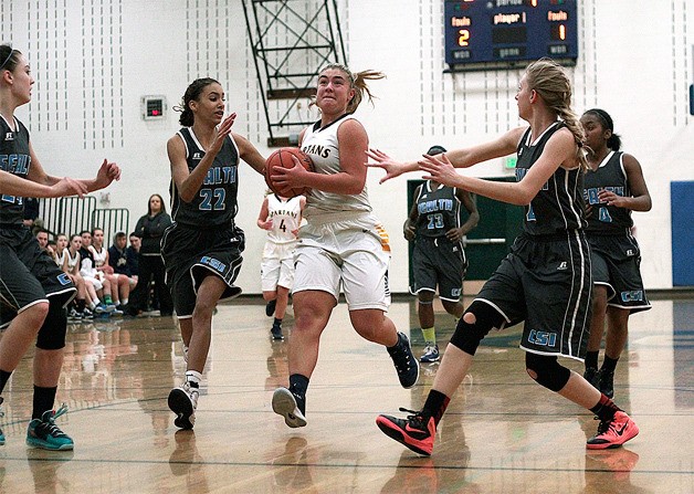 BHS junior wing Katie Usellis eyes the hoop while bringing the ball back down the court in Wednesday’s game against Chief Sealth.