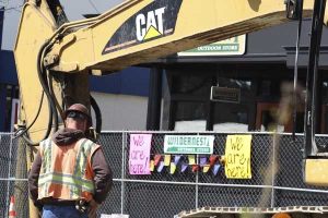 Businesses have signs up and down Winslow Way that state they are open during construction.