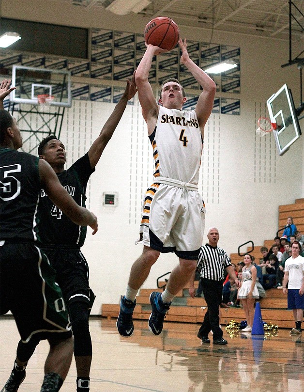 BHS senior Blake Swanson takes a shot late in Tuesday's game against Franklin High. The Spartans led at the end of the first half