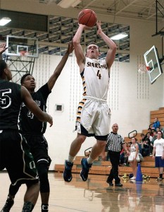 BHS senior Blake Swanson takes a shot late in Tuesday's game against Franklin High. The Spartans led at the end of the first half