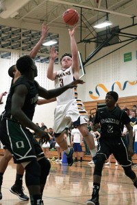BHS senior Trent Schulte takes a shot late in Tuesday’s game against Franklin High. The Spartans led at the end of the first half