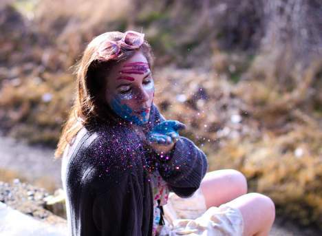 Eliza Silverman serves as a model for an advanced photography assignment for BHS photographer Jenna Knell. Knell developed and executed a theme with the model involving multi-colored dust and unique makeup using the backdrop of the Blakley Mill site. Check out next weeks Review to see the results of Knell's photo shoot with the model