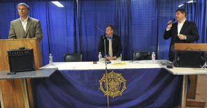 Incumbent Jay Inslee (left) and challenger James Watkins offered their points of view during the heated debate. Islander Fred Scheffler (center) moderated the event.