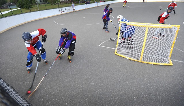 The Avalanche take on the Senators in Division 3 competition at Battle Point Park Monday. Bainbridge Island Roller Hockey
