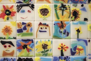 Four hundred Ordway students teamed with professional glass artists to create a memorial at the school for Suzy Peters