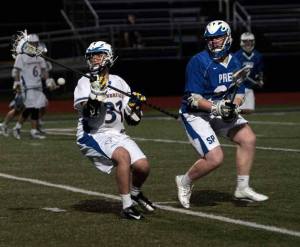 Gabe Emert of BHS battles for the ball against a Seattle Prep defender during the Spartans' win over the Panthers Tuesday.