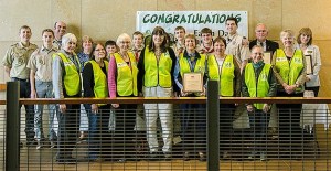 Members of Boy Scout Troop 1564 and Zero Waste pose with their Earth Day plaques.
