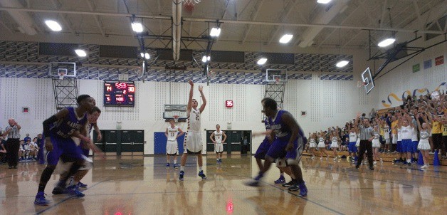 The Spartans try to chip away at the Bulldogs' lead from the charity stripe during Friday's Metro matchup in Paski Gymnasium.