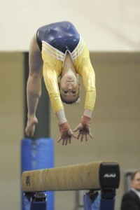Bainbridge gymnast Anne Schwartz completes a back handspring skill on the balance beam during the Metro League gymnastics meet Feb. 5 at Bainbridge High School.