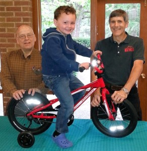 Calvin Roberson sits on his new bike.