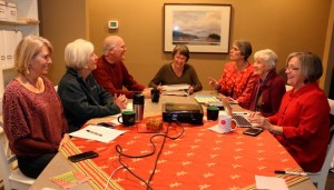 The community engagement committee gathers for a village planning session. From left: Robin Gaphni (Island Volunteer Caregivers)