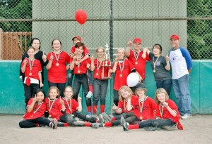 The Intermediate Racers gather for a victory photo after winning the league title in the Bainbridge Island Little League.