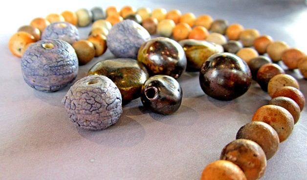 Ceramic beads by various artists are on display at The Island Gallery this month as part of the show “Bonnets