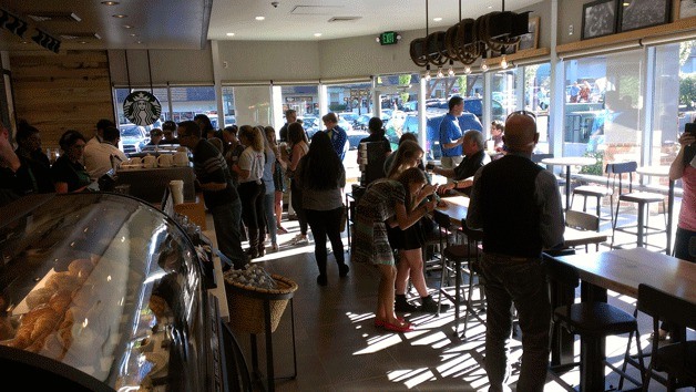 People check out the new Starbucks on High School Road during a sneak preview Thursday. The new coffee shop opened to the public Friday.