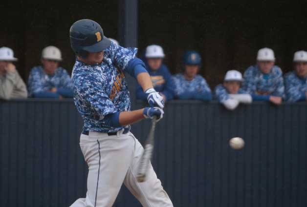 The BHS dugout watches as the visitors from Rainier Beach take their turn at bat early in last week’s game.