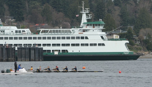 The Bainbridge Womens Varsity 4x crosses the finish line in front of Olympia in the Salt Wata Regatta in Eagle Harbor for third place. Bainbridge won six races in Saturday's regatta.