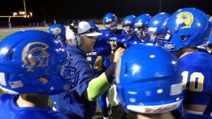 Bainbridge talks it over after the Spartans gain an early edge over Evergreen.