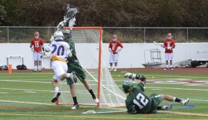 Jacob Goodman scores the winning goal against O.E.S. Sunday at the Northwest Invitational.