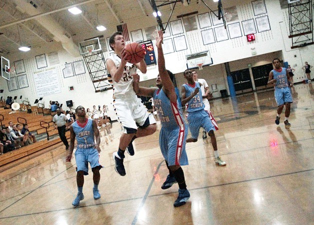 Freshman guard/wing Lyle Terry goes up for a basket during the Spartan home game against Chief Sealth Tuesday